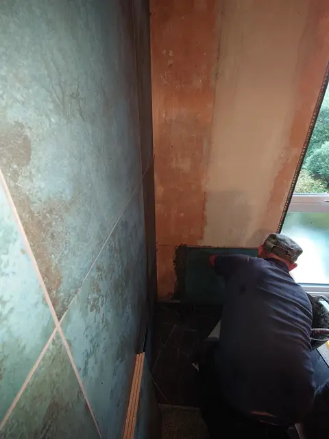 Large format green and copper metal-effect porcelain in a second Taunton bathroom